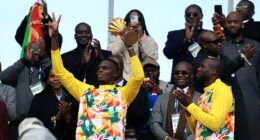 Senegal have paraded their Africa Cup of Nations trophy despite being stripped of the title