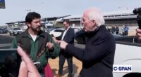 Republican Senator John Cornyn (right) points his finger at Democratic Representative Greg Casar (left) outside the Austin airport Monday as the two Texans tussled over TSA funding