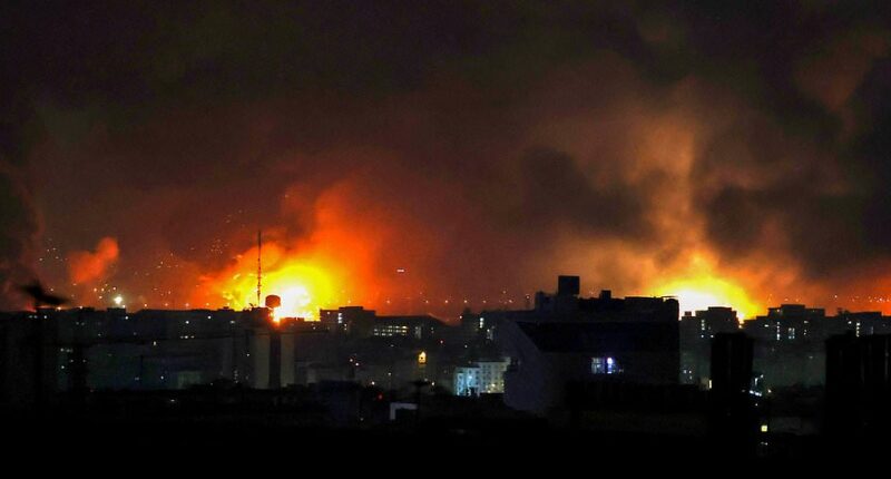 Dubai airport is evacuated in drone attack as Israel launches fresh wave of strikes on Tehran: live updates