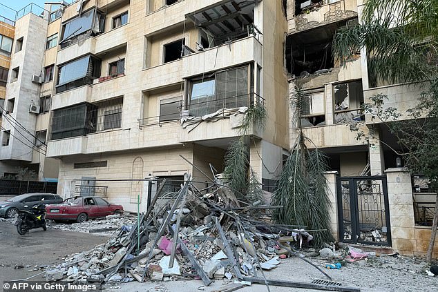 Debris is seen at the bottom of a damaged building after an Israeli airstrike in Beirut's southern suburb neighborhood of Haret Hreik on March 2