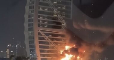 Footage showed the Burj Al-Arab hotel ablaze after being 'targeted by an Iranian suicide drone'