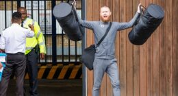 On the first day of Labour's scheme in September 2024, lags released early were seen celebrating outside jails. Pictured: A man celebrates as he is released from HMP Wandsworth