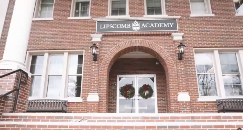 A brick building with a "Lipscomb Academy" sign on it
