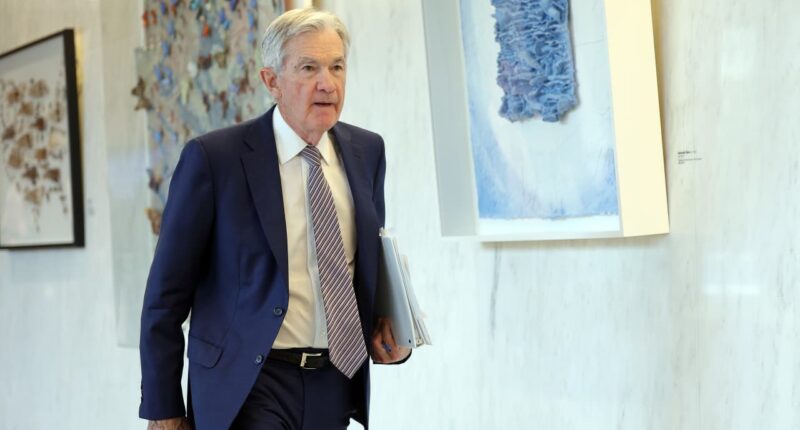 Fed chief Powell says risks to economy suggest rates could go lower or higher