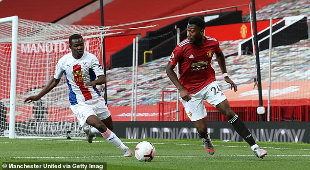 Timothy Fosu-Mensah in action for United against Crystal Palace in September 2020