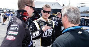 Former NASCAR driver Chase Pistone (pictured center) has died at the age of 42