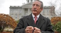 Mark Sanford speaks during a news conference in front of the Statehouse, November 12, 2019, in Concord, New Hampshire