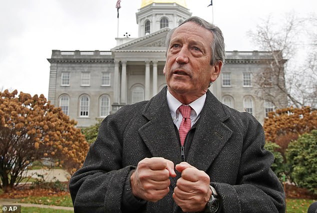 Mark Sanford speaks during a news conference in front of the Statehouse, November 12, 2019, in Concord, New Hampshire