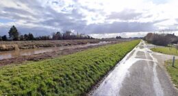 A frantic search is on for two missing teenagers after a car with five youngsters inside plunged into a river near a road in Wisbech St Mary, Cambridgeshire, pictured