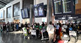 Frightened holidaymakers and British nationals scramble for flights home. Pictured: Dubai airport this week. Pictured: Passengers wait at Muscat International Airport