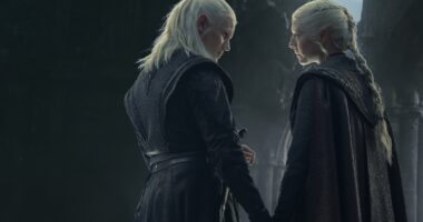 Daemon (Matt Smith) and Rhaenyra (Emma D'Arcy) hold hands in House of the Dragon season 2 episode 8.