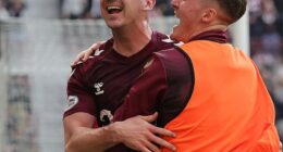 McEntee celebrates his late goal which gave Hearts all three points