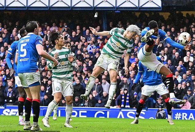 Daizen Maeda's header hits Rangers defender Dujon Sterling on the hand