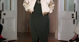 A model struts in a funnel-neck jacket at the Nanushka Spring/Summer 26 runway in September