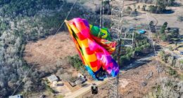A man and a woman, who have not been identified, were rescued from the hot air balloon after it crashed into a radio tower in Texas at around 8.15am on Saturday