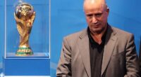 Iranian Football Federation president Mehdi Taj (pictured with the men's World Cup trophy) has launched an unhinged attack on Australia, accusing the government of abducting and taking players from the national women's team hostage