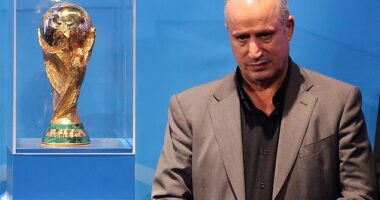 Iranian Football Federation president Mehdi Taj (pictured with the men's World Cup trophy) has launched an unhinged attack on Australia, accusing the government of abducting and taking players from the national women's team hostage