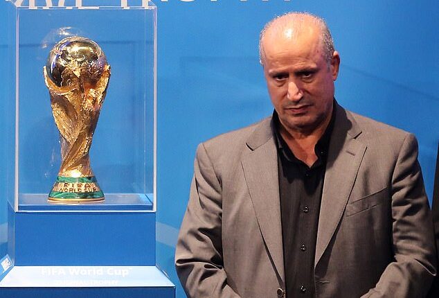 Iranian Football Federation president Mehdi Taj (pictured with the men's World Cup trophy) has launched an unhinged attack on Australia, accusing the government of abducting and taking players from the national women's team hostage