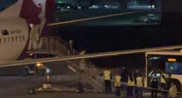 The Iranian women's soccer team have left Australia (pictured are the women disembarking a flight from the Gold Coast to Sydney to catch a transfer bus to their international flight)