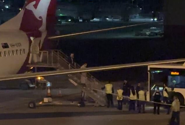 The Iranian women's soccer team have left Australia (pictured are the women disembarking a flight from the Gold Coast to Sydney to catch a transfer bus to their international flight)
