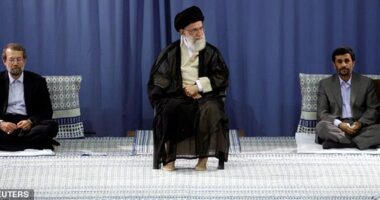 FILE PHOTO: Iranian President Mahmoud Ahmadinejad (R) and Parliament Speaker Ali Larijani (L) listen to a speech by Supreme Leader Ayatollah Ali Khamenei during a ceremony for Ahmadinejad's confirmation as Iran's President in Tehran  August 3, 2009. Iran's supreme leader formally approved the second term presidency of Ahmadinejad on Monday after a disputed election that leading reformists say was rigged to ensure the incumbent's victory.  REUTERS/khamenei.ir  QUALITY FROM SOURCE/File Photo