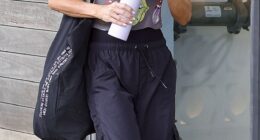 Jackie 'O' Henderson has reportedly accused her former employer, ARN, of wrongful termination and misleading investors following the collapse of her $200 million radio deal with co-host Kyle Sandilands (Henderson is pictured on Friday heading to the gym)
