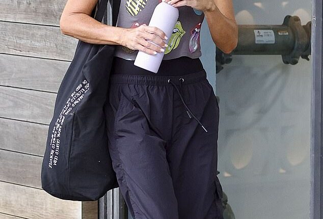 Jackie 'O' Henderson has reportedly accused her former employer, ARN, of wrongful termination and misleading investors following the collapse of her $200 million radio deal with co-host Kyle Sandilands (Henderson is pictured on Friday heading to the gym)