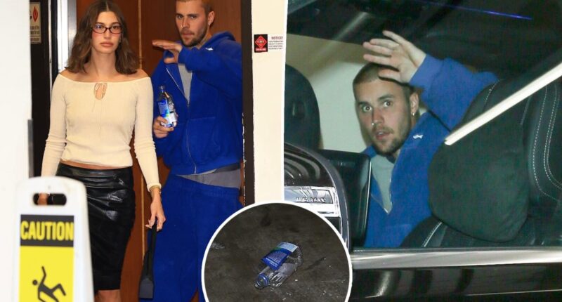 Justin Bieber hurls water bottle at paparazzi following sushi date with wife Hailey