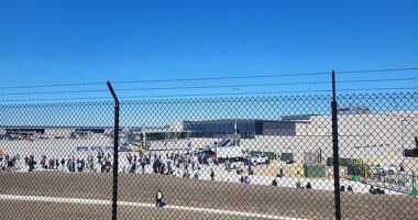 Confused and terrified passengers were seen dragging their bags out of the airport and onto the tarmac as all flights were grounded out of the Midwest hub