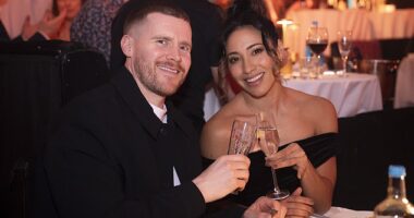 Karen Hauer was supported by her boyfriend Simon Davidson and former Strictly co-stars as she made her first public appearance since being sensationally axed from the BBC show