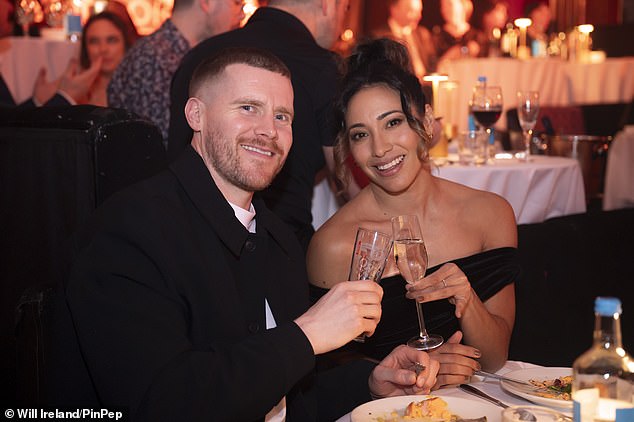 Karen Hauer was supported by her boyfriend Simon Davidson and former Strictly co-stars as she made her first public appearance since being sensationally axed from the BBC show