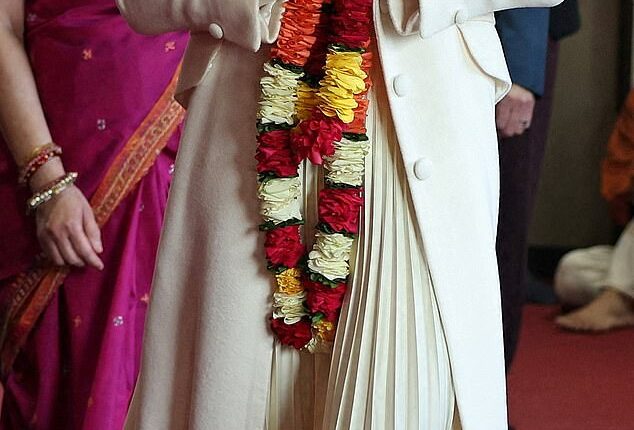 The Princess of Wales looked elegant in a Ralph Lauren dress as she visited the Shreeji Dham Haveli Hindu Temple in Leicester yesterday