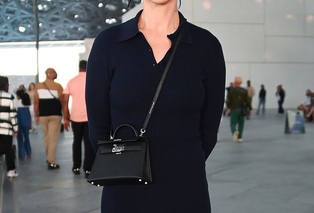 Katy Perry has found herself in the firing line after fans blasted her for what they called a ‘tone-deaf’ response to a follower who admitted she might have to sell her concert ticket just to survive; (pictured December)