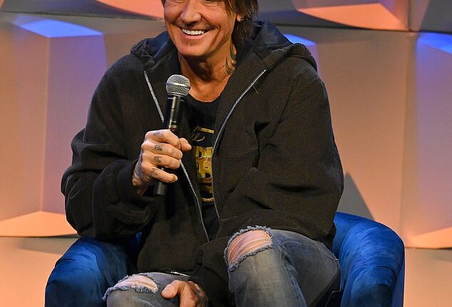 Keith Urban put on a happy face as he turned up to The Power of Music and A Mission event in Nashville on Thursday - just days after rumors of a romance between his ex-wife NIcole Kidman and her Scarpetta co-star Simon Baker began to swirl