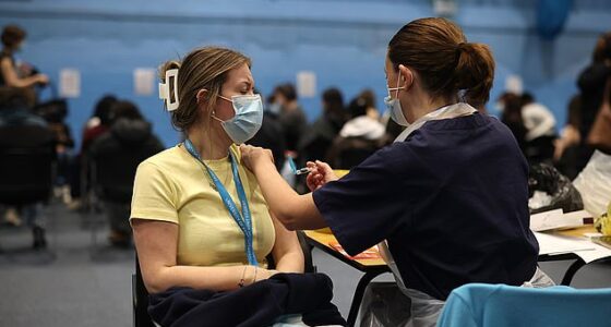 A student receives the Meningitis B vaccine at the University of Kent in Canterbury today