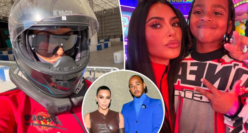 Kim Kardashian channels boyfriend Lewis Hamilton in racing gear during family getaway to Tokyo