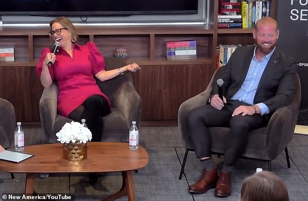 Krysten Sinema alongside her former bodyguard Matthew Ammel, with whom she is accused of having an affair, at an event in October