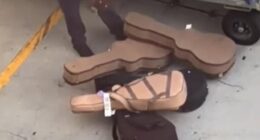 A careless baggage handler at LAX was captured tossing guitars on the floor while unloading a luggage cart on March 16