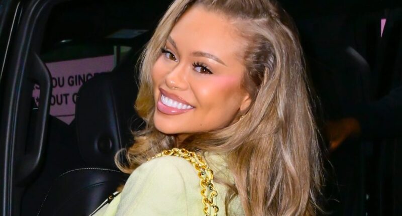 Latto Seemingly Confirms Pregnancy With Baby Bump Reveal In 'Business & Personal' Music Video