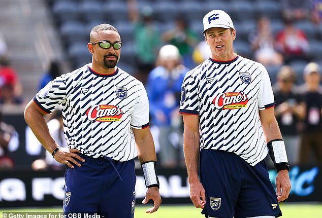 Hurts and Brady of the Founders FFC look on before the Fanatics Flag Football Classic