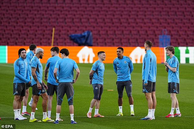 Newcastle's players take in the magnificent Nou Camp on Tuesday night ahead of the game