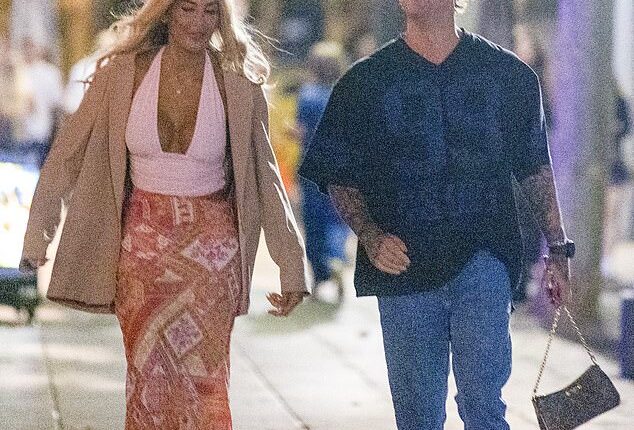 Married At First Sight bride Gia Fleur has been photographed enjoying a romantic night out in Melbourne with her new boyfriend Alan Wallace after confirming their bombshell romance