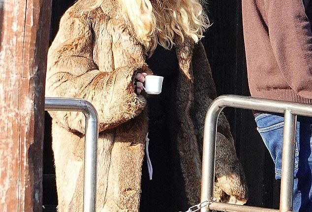 Madonna, 67, looked effortlessly chic, sipping on an espresso while wearing a giant Louis Vuitton hat in Venice on Monday