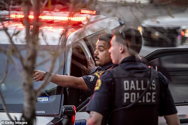 Police work to clear a scene outside of a watch party for GOP Texas Senate Candidate Ken Paxton after arresting a man for reportedly have multiple magazines of ammunition in his car on March 3, 2026 in Dallas, Texas