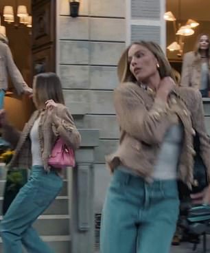 Margot Robbie, 35, has channelled her inner Y2K-era Kylie Minogue, 57, in a new advertisement for Chanel handbags that went live on Monday