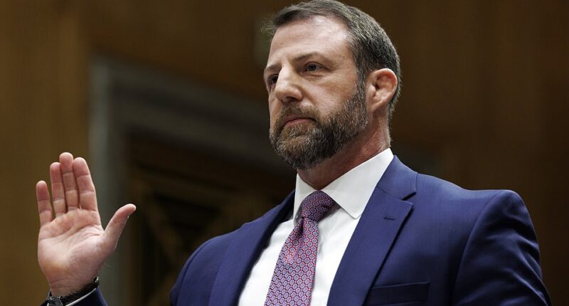 Markwayne Mullin, Donald Trump's pick to replace ousted Department of Homeland Security Secretary Kristi Noem, has been confirmed by the United States Senate. The Republican Senator cleared the simple majority needed to be confirmed to his post. Notably, one of the votes came from himself. Democrat s John Fetterman of Pennsylvania and Martin Heinrich of New Mexico crossed party lines and sided with the majority of Republicans to approve the nomination, which was confirmed 54-45 on Monday evening. However, Republican Senator Rand Paul, chairman of the Senate Homeland Security Committee, voted against the nominee due to their open hostility toward each other. Mullin had previously called Paul a 'freaking snake' - but later apologized.