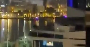 The US Consulate building in Dubai is up in flames after reportedly being struck by an Iranian drone