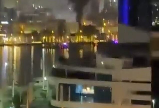 The US Consulate building in Dubai is up in flames after reportedly being struck by an Iranian drone