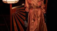 Maya Jama turned heads in a toffee brown trench coat as she attended AnOther Magazine and Burberry's anniversary dinner at Simpson's in the Strand, London, on Tuesday evening