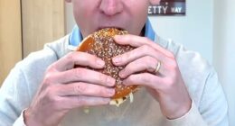 McDonald's CEO and chairman Chris Kempczinski has been mocked online after posting a promotional video of himself trying the chain's new Big Arch Burger